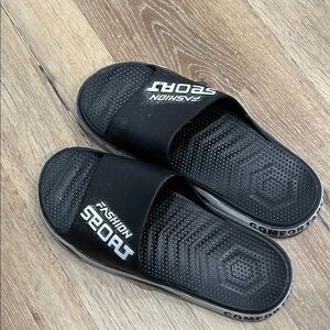 Black Slide Sandals with White Text